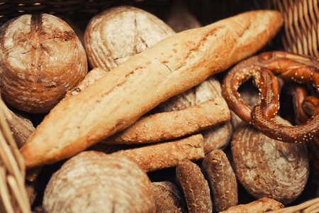 Different kinds of bakery: bagel, baguette, loaf and othersの写真素材