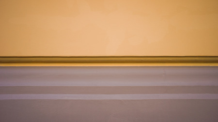 Orange and brown concrete wall の写真素材
