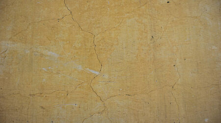 Yellow cement wall textureの写真素材