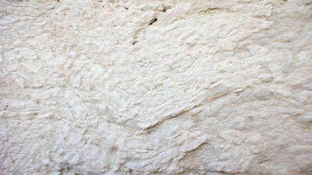 Textured white concrete wallの写真素材