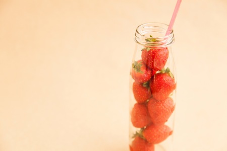 Healthy strawberry in the bottleの写真素材