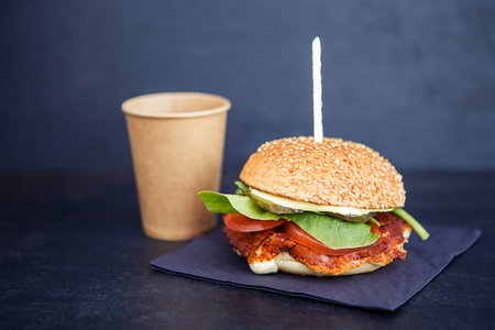Set of coffee and fastfood burger on the black backgroundの写真素材
