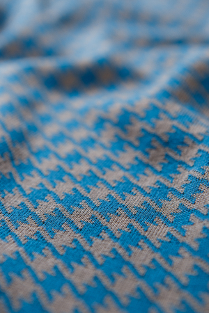 Close-up textile pattern in blue and grey colors as background
