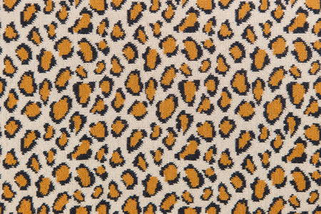 Closeup leopard pattern cotton knitted textile as background