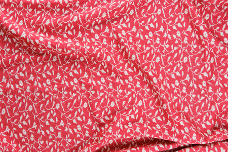 Rose color cotton knitted textile with interesting pattern