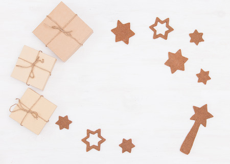 Craft presents and gifts on the white background with shaped bakery.の写真素材