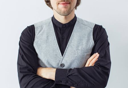Young man in black shirt with gesture of confidenceの写真素材