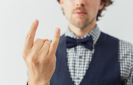 Man with beard wearing bowtie with funny gesture, hipster styleの写真素材