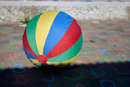 Summer games concept. Large colorful inflatable ball near swimming pool. High quality photoの写真素材