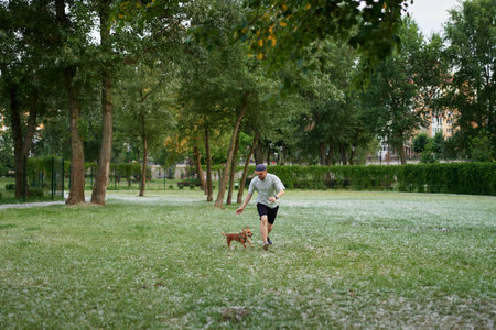 Support, care or happy family, man and kids bonding with foster puppy or pet and enjoying time together. High quality photoの写真素材