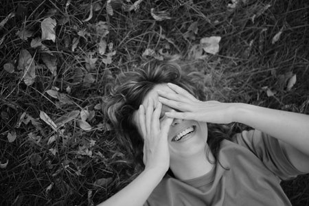 Face, smile and portrait of a woman happy in a park in summer for beauty, excited and confident in nature. garden and female person or model outdoor with freedom, happiness, style. High quality photoの写真素材