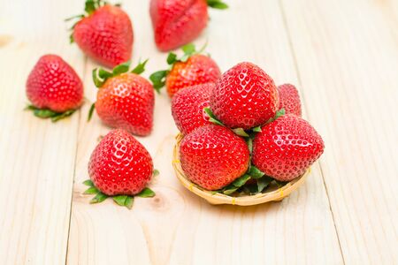 Ripe strawberries placed in the trayの写真素材