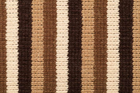 Knitted fabric texture for background. Brown stripes, closeupの写真素材