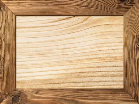 Natural wood frame with wooden plank insideの写真素材
