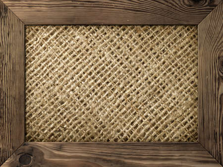 Old wood frame with burlap material insideの写真素材