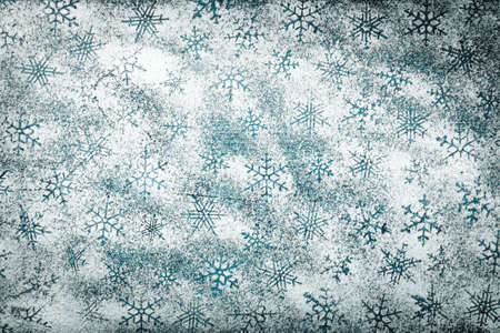 Snowflake pattern made %u200B%u200Bof icing sugar on wooden table