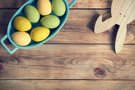 Easter background with Easter eggs and bunny. Top view. Copy spaceの写真素材
