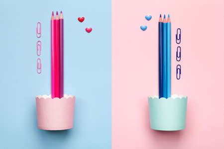 Pink and blue pencils on pastel background. Minimal style. Flat lay. Copy space. Top viewの写真素材