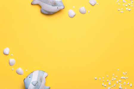 Summer holiday vacation background with fish and seashell. Copy space. Top viewの写真素材