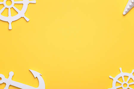 Summer holiday vacation background with starfish, anchor and rudders in white. Copy space. Top viewの写真素材