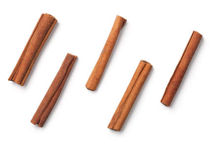 Cinnamon sticks isolated on white background. Top viewの写真素材