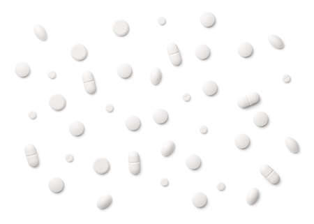 White pills isolated on white background. Copy space. Top view