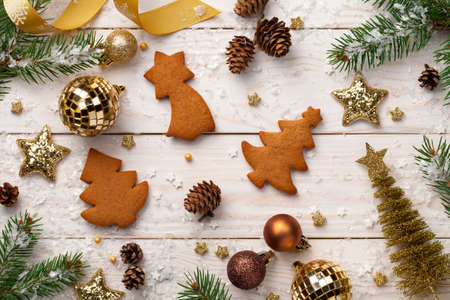 Christmas background with gingerbreads on wooden table.  Top viewの写真素材
