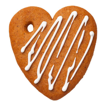 Gingerbread heart cookie isolated on white background. Top viewの写真素材
