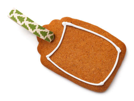 Gingerbread label cookie with ribbon isolated on white background. Top viewの写真素材