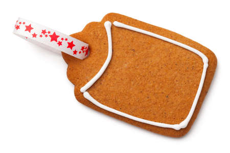 Gingerbread label cookie with ribbon isolated on white background. Top viewの写真素材
