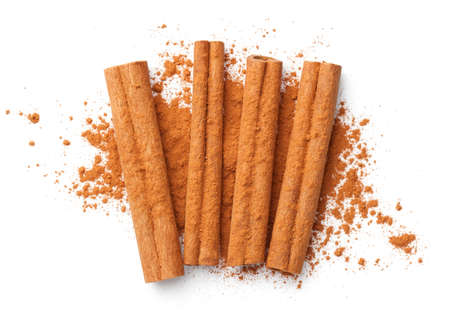 Cinnamon sticks and powder isolated on white background. Flat lay. Top viewの写真素材
