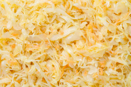 Sauerkraut with carrot background. Full frame texture. Flat lay. Top viewの写真素材