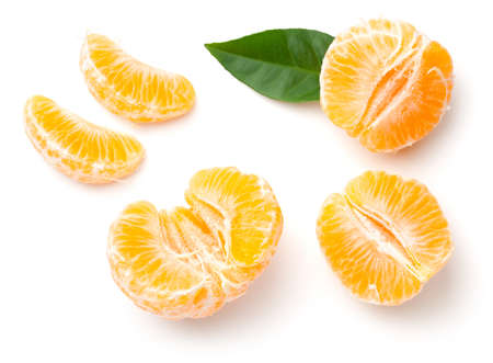 Peeled mandarin oranges isolated on white background. Set of tangerines or clementines. Top view, flat layの写真素材