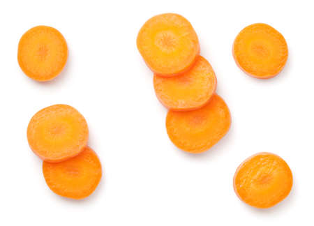 Carrot slices isolated on white background. Flat lay. Top viewの写真素材