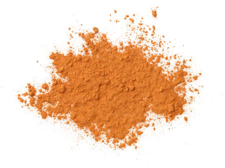 Cinnamon powder isolated over white background. Top viewの写真素材