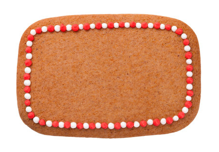 Gingerbread christmas cookie in shape of rectangle isolated on white backgroundの写真素材