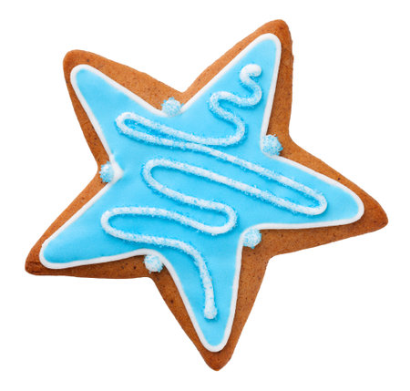 Gingerbread cookie in shape of star for christmas isolated on white backgroundの写真素材