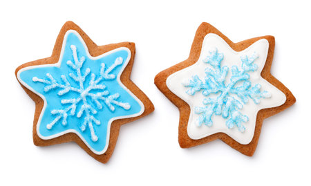 Gingerbread cookies in shape of star for christmas isolated over white backgroundの写真素材