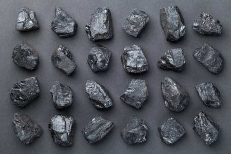 Coal lumps over black background. Top viewの写真素材