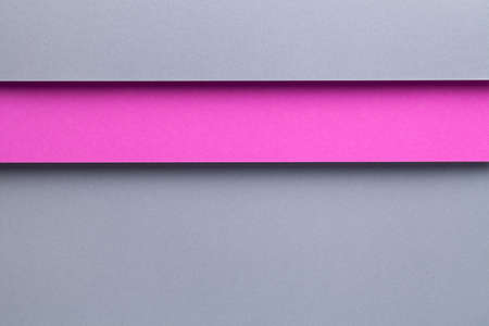 Abstract geometric composition background with gray and pink paper layers. Top view, flat layの写真素材
