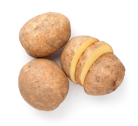 Raw potatoes isolated on white background. View from aboveの写真素材