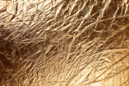 Texture of golden metallic fabric as abstract の写真素材