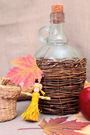 still-life with straw dolls and decorationsの写真素材