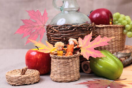still-life with straw dolls and decorationsの写真素材