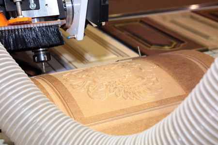 KRASNODAR - RUSSIA, april - 3, 2014, Automatic milling CNC machine for furniture manufactoring at exhibition UMIDS 2014のeditorial素材