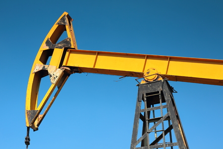 Oil pump on the blue sky background