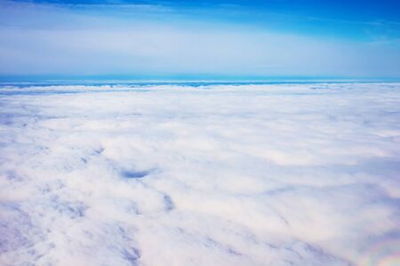 view panorama sky and cloudscape from airplane windowの写真素材