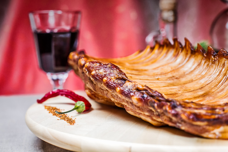 Smoked ribs with spices and vegetablesの写真素材