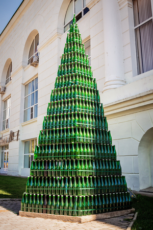 pyramid of empty bottles of champagneの写真素材