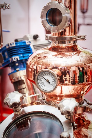 fragment of copper alembic for making alcoholの写真素材